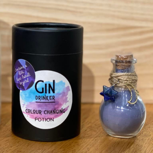 Colour changing potion bottle with real lapis lazuli crystal. Contains blue butterfly pea flower poweder.